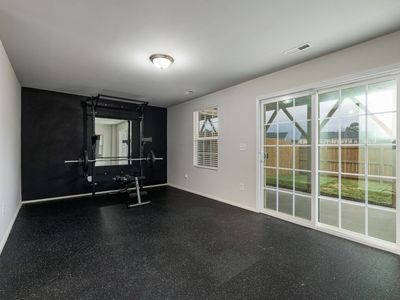 Minimalist home gym space with natural light.